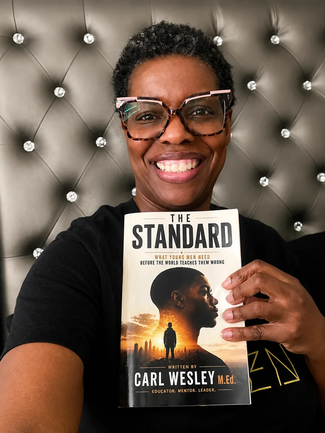 Reader holding The Standard by Carl Wesley 02