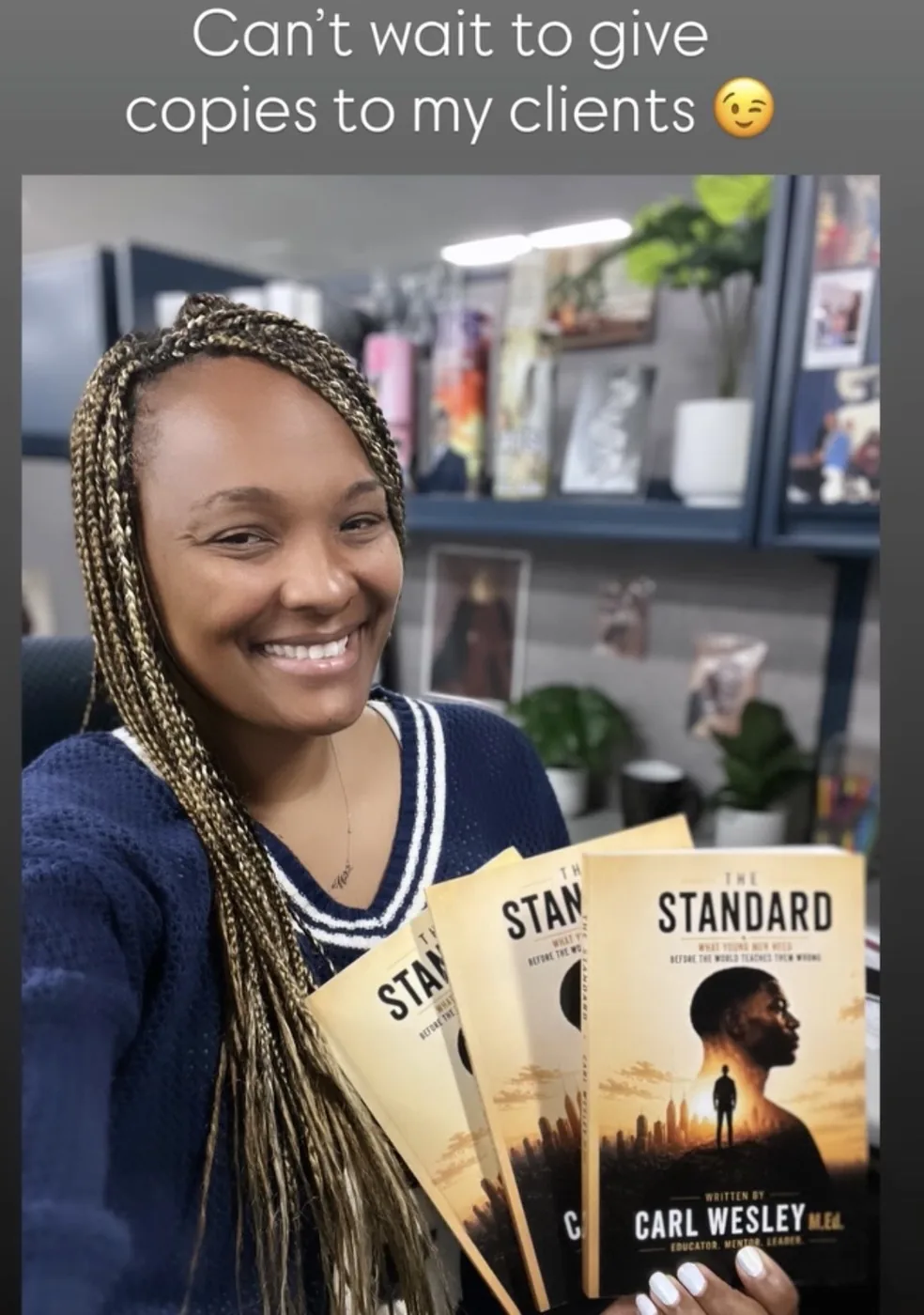Reader holding The Standard by Carl Wesley 07